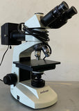 Dual Illumination Polarized Light Compact Trinocular Metallurgical Microscope.